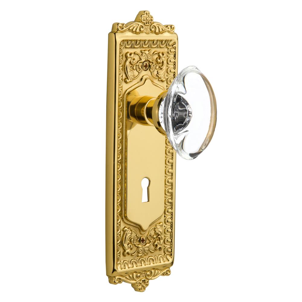 Nostalgic Warehouse EADOCC Mortise Egg and Dart Plate with Oval Clear Crystal Knob and Keyhole in Unlacquered Brass
